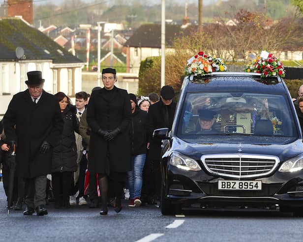 Pacemaker Press 10-12-2023: Funeral for Lurgan murder victim Odhran Kelly. 
Mr Kelly’s funeral Mass took place at St Peter’s Church in Lurgan on Sunday before burial at St Colman’s Cemetery. Mr Kelly’s body was found close to a burning vehicle in the Edward Street area of Lurgan in the early hours of Sunday morning. The 23-year-old nursing assistant said he died suddenly and was the beloved son of Jacqueline and the late Paul, and the much loved brother of Paul and the late Sinead.
Picture By: Arthur Allison: PacemakerPress.
