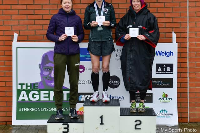 On the podium after their half marathon success: 1. Gillian McCrory; 2. Helen Perry; 3. Debbie McConnell. Picture: Mervyn McKeown
