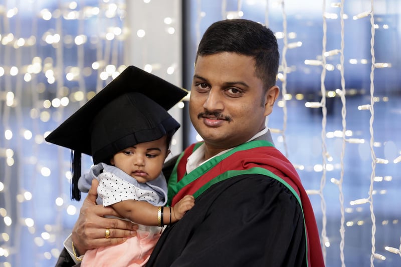 Harish Krishnan, pictured with Durga, graduates from Ulster University with MSc in International Tourism at the Winter Graduation Ceremony at the Waterfront Hall, Belfast.