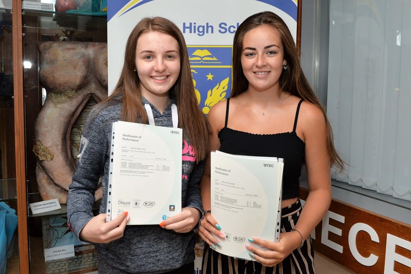 Pictured in 2018 are Larne High School students, Rhiann Cowie (left), who got 1 A, 4 Bs and 5 Cs, while Jodie McKinstry got 1 A star, 1 A, 3Bs and 5 Cs in their BTEC exams. INLT 35-013-PSB