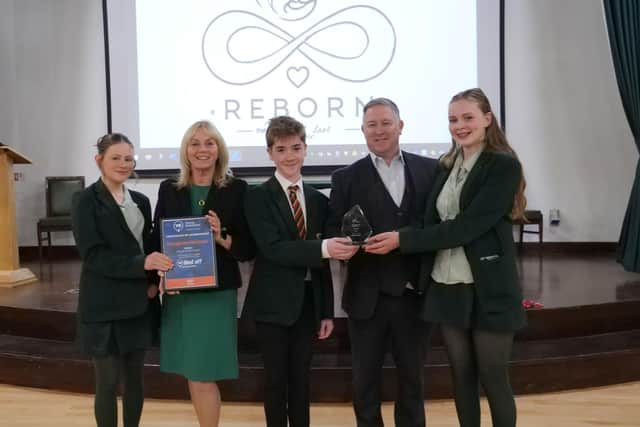 The winning 'ReBorn' team pictured with Alderman Amanda Grehan, Regeneration & Growth Chair and Brian Sofley, ASSA ABLOY