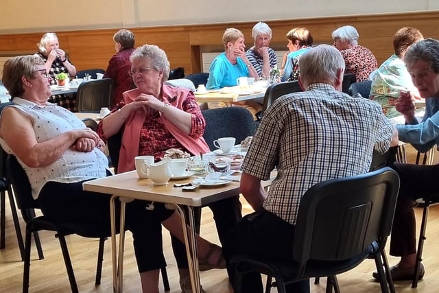 Enjoying some coffee and conversation at Ballycastle Parish Centre at the recent Christian Aid coffee morning. Credit McAuley Multimedia