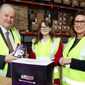 At CIGA Healthcare premises in Ballymena are, from left to right, Irwin Armstrong, owner and CEO, CIGA Healthcare, Economy Minister Caoimhe Archibald and Anne Beggs, executive director of international business and skills, Invest NI. Photo: PressEye