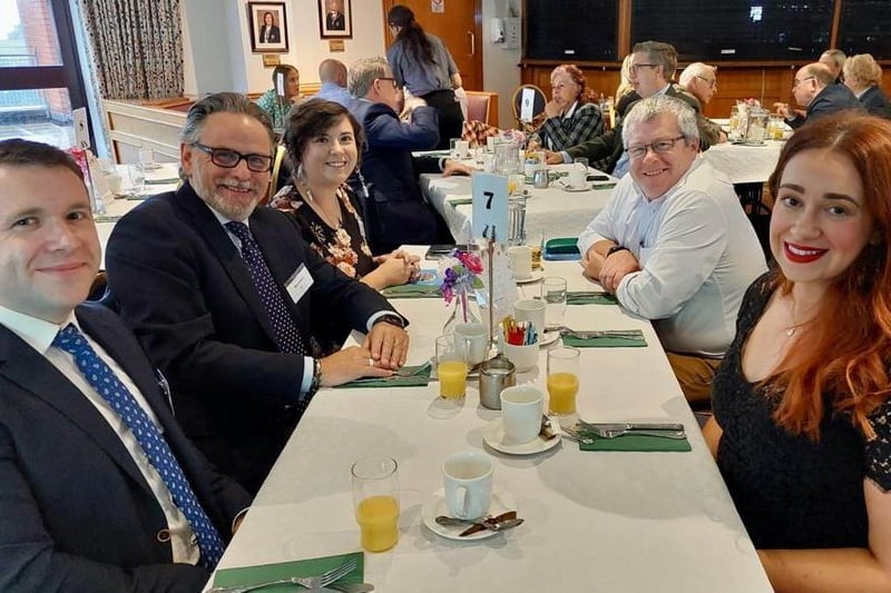 Guests in conversation over breakfast at Carrickfergus Golf Club.