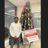 Yusaf Mahat, a member of Rotary Portadown, who was manning the Tree of Remembrance on Wednesday evening at Tesco in Craigavon, Co Armagh.