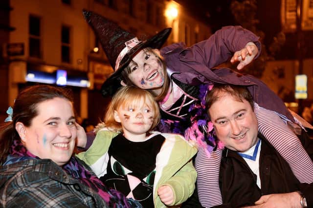 HALLOWEEN SMILES...Robyn Laverty with her friend Lee-Anne Boal travelled from Ballymoney with Mr. and Mrs Stephen and Mitzi Laverty to enjoy Coleraine Borough Council’s Hallowe'en events in 2009