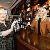 United Wines launched a designated driver campaign in the run-up to Christmas 2023 to support safe and responsible driving over the festive season. The company rewarded designated drivers with a free Heineken®0.0 or Birra Moretti Zero when they made themselves known to bar staff by showing their car keys at participating venues.  Pictured are Gemma Herdman and Maura Bradshaw of United Wines, enjoying a bottle of no alcohol beer at The Morning Star bar in Belfast’s city centre.  Picture: Phil Magowan / Press Eye