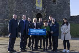 Pictured with the Mayor of Mid and East Antrim, Alderman Gerardine Mulvenna, at the announcement of the design team appointment for the Carrickfergus City Deal regeneration project are (l-r):  Jonathan Porter, council; Councillor Bobby Hadden; Jonathan McGrandle, council; Alderman Robert Logan; Paul Price, DfC; Andrew Todd, Tandem Design; Gerard Murray, DfC and  Hannah Lambe, McAdam Design. Photo submitted by Mid and East Antrim Council.