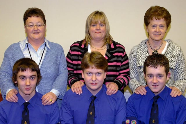 Castledawson Boys Brigade members who received their President's Badges from their mums during the annual display in 2007. Pictured are Leslie Gregg and his mum Jennifer, Stephen Mawhinney and his mum Arlene and Melvin Fulton and his mum Florence.