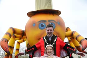 Mayor Carson and his daughters Isabella and Penelope enjoying the set-up for the Mayor's Carnival Parade and Family Fun Day.