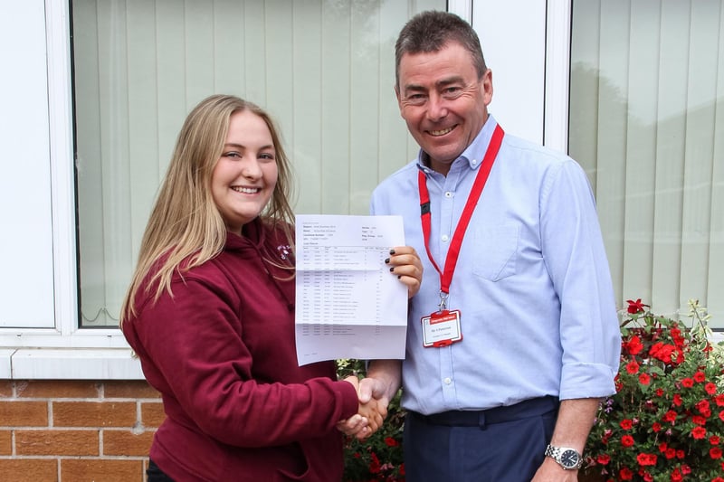Pictured on results day at Glengormley High School in 2015 is Anna O'Conner (2A*s, 3As and 2Bs) with teacher Mr Patterson.  INNT 34-505-SO
