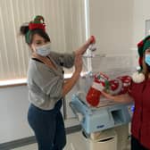 Neonatal Nurse, Nikita Harron and Neonatal Breastfeeding Lead Nurse, Cathy Flinn spreading Christmas joy in the Ulster Hospital's Neonatal ICU
