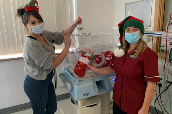 Neonatal Nurse, Nikita Harron and Neonatal Breastfeeding Lead Nurse, Cathy Flinn spreading Christmas joy in the Ulster Hospital's Neonatal ICU