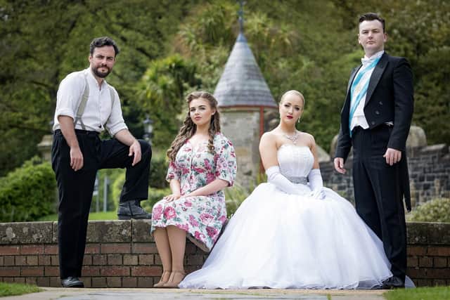 David McCrossan as Everyman, Caroline McMichael as young Eva Duarte, Karen Hawthorne as Eva Peron aka Evita, Matthew Watson as Juan Peron. Pic credit: Ulster Operatic Society