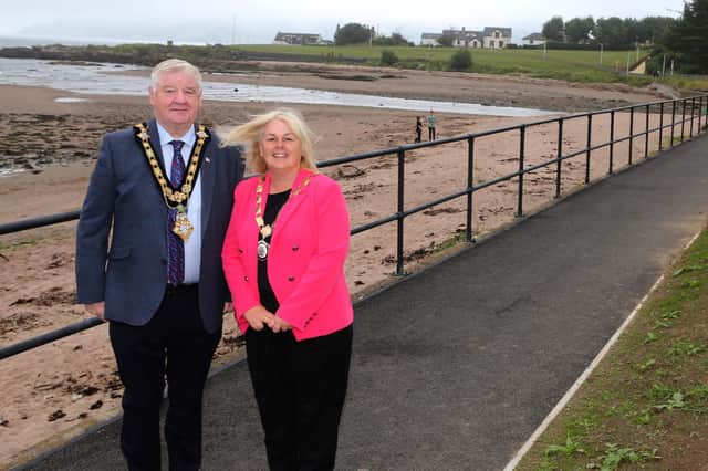 Mayor of Causeway Coast and Glens, Councillor Steven Callaghan and Deputy Mayor, Councillor Margaret-Anne McKillop at the newly upgraded coastal path in Cushendall. Credit CCGBC