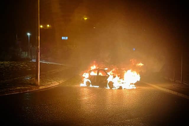 The car on fire in Co Armagh.