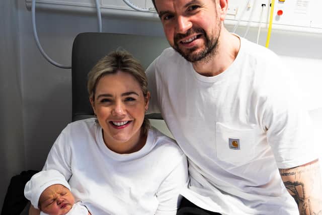 Mum Cathy and dad Mark Woodside with baby Teidí. Pic credit: SEHSCT