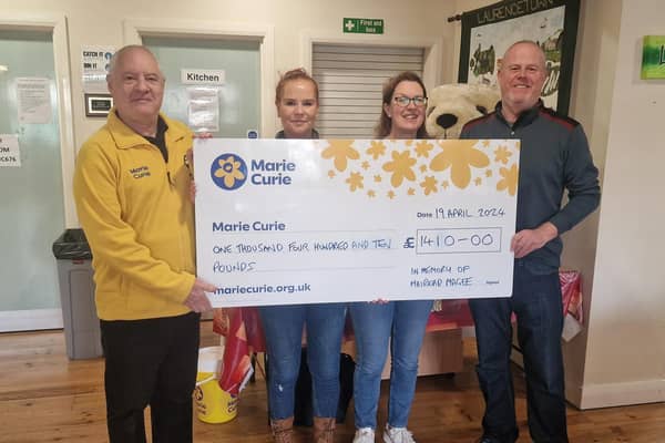L-R: Phil Kane from Marie Curie, Siobhan Magee, Claire Patience, Manager of Laurencetown Community Centre and Paul Magee.