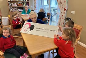 Residents from Pond Park Care Home enjoy some festive celebrations with children from Jolly Rodgers Day Nursery. Pic credit: LGNI