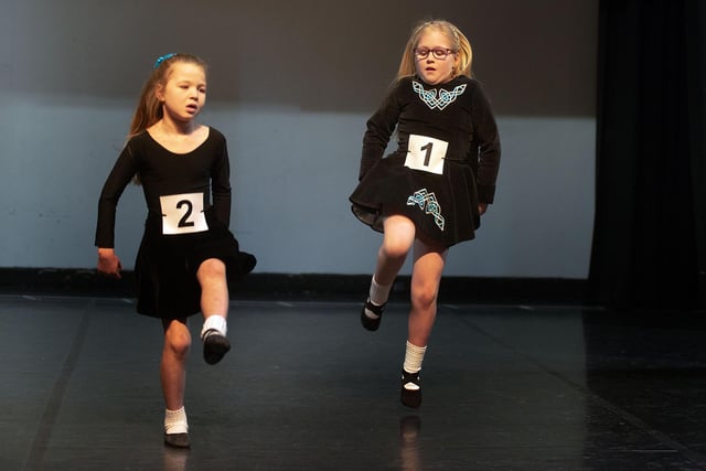 Tegan Kofa, left, and Cait Hamill taking part in the under 8 years Light Double Jig competition at the Portadown Folk Dancing Festival confined section in Portadown Town Hall. PT10-219.