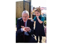 MP Hilary Benn, Secretary of State, with pupils from Mill Strand IPS.