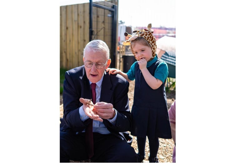 MP Hilary Benn, Secretary of State, with pupils from Mill Strand IPS.