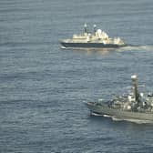 Undated photo issued by Royal Navy of HMS Somerset flanking Russian ship Yantar near UK waters. Defence Secretary John Healey has warned Mr Putin "we see you, we know what you are doing and we will not shy away from robust action to protect this country".