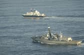 Undated photo issued by Royal Navy of HMS Somerset flanking Russian ship Yantar near UK waters. Defence Secretary John Healey has warned Mr Putin "we see you, we know what you are doing and we will not shy away from robust action to protect this country".