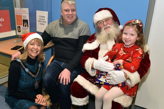 Pictured during the Lord Mayor's visit to Craigavon Area Hospital are from left, Alderman Margaret Tinsley, Nigel Gibson, Santa and Elianna Gibson (3).