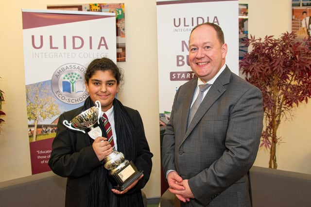 The Hughes Cup was awarded to Irza Khan pictured with Mr Houston, principal.