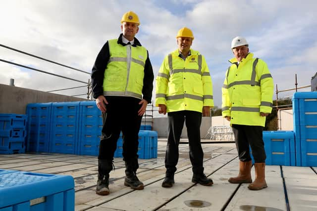 Pictured from left: SRO ACFRO Aidan Jennings, Peter May Permanent Secretary DoH, Damien Gill Felix O’Hare contractors). Credit: Submitted