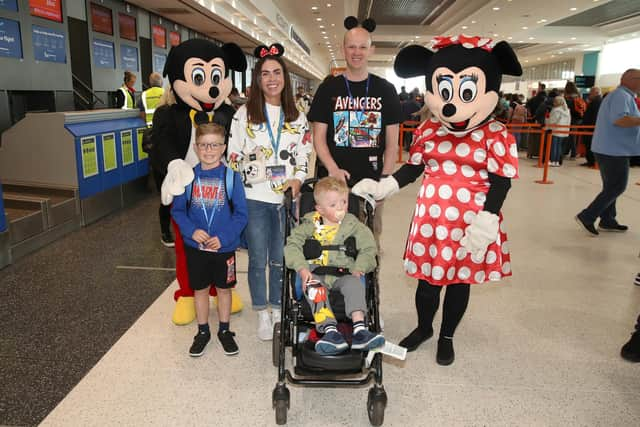 Dylan and Rory with mum and dad from Dunmurry