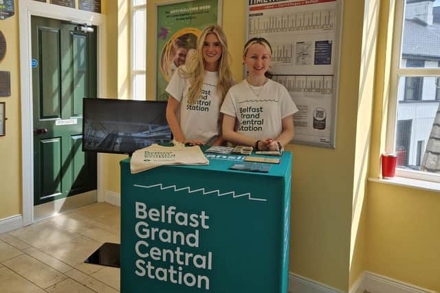 Georgia and Ellie from the Translink Grand Connection Roadshow at Whitehead Train Station. Photo: Helena McManus