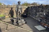 The statue in Bushmills of Robert Quigg. Credit NI World