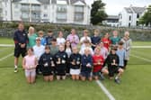 Mayor of Causeway Coast and Glens, Cllr Dawn Huggins, with referee Sean Moloney and winners of the Junior Tennis Tournament at the Alex McFarland Tennis Courts, Ballycastle.