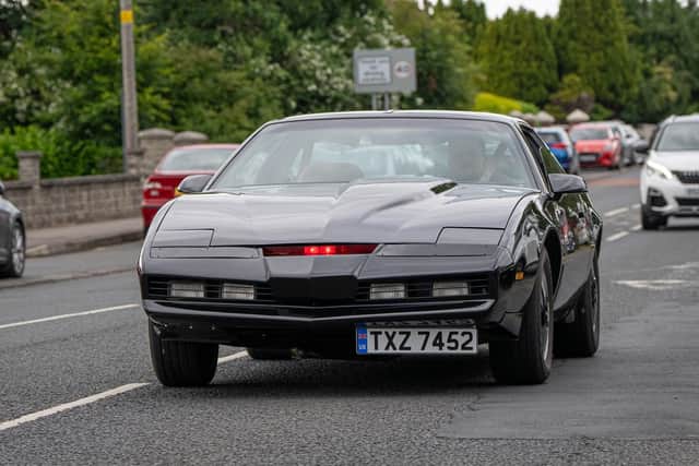 Davy turns heads when he drives the car around Northern Ireland roads, seen here taking it for a spin through Waringstown. Photo: Paul Donnell