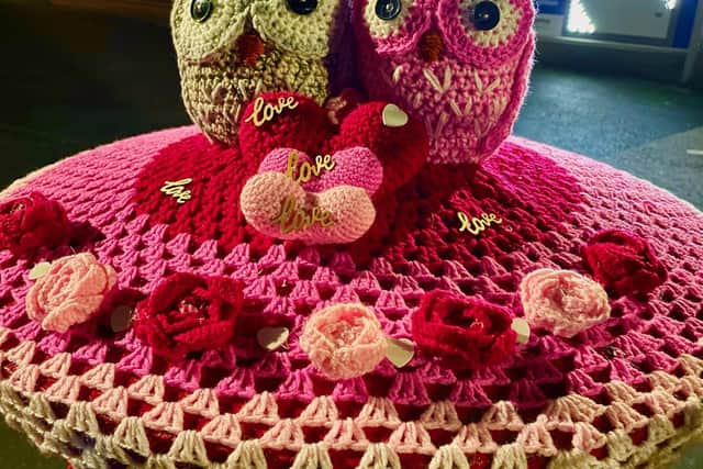 The latest Valentine's Day themed postbox topper from Lambeg's Phantom Crocheter