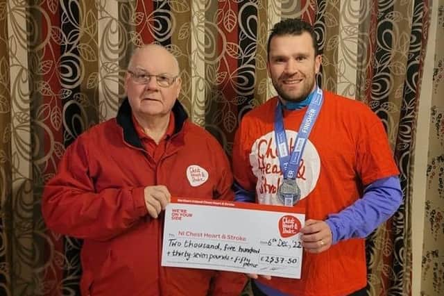 Springwell Running Club's Jonathan Huddleston presents a representative from NI Chest Heart and Stroke with a cheque for £2,537.50.  Jonathan ran the Irish Life Dublin Marathon in support of Northern Ireland Chest Heart and Stroke. He sadly lost his father in March 2022 and decided to support this great charity in memory of his late father. His father enjoyed training as an amateur footballer and loved Dublin, so Jonathan decided Dublin Marathon was a perfect way to remember him.