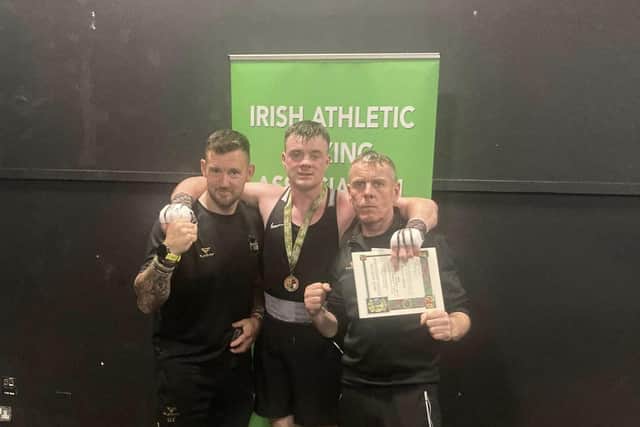 Ryan Murphy with coaches Dessie Toman and Owen Murphy.