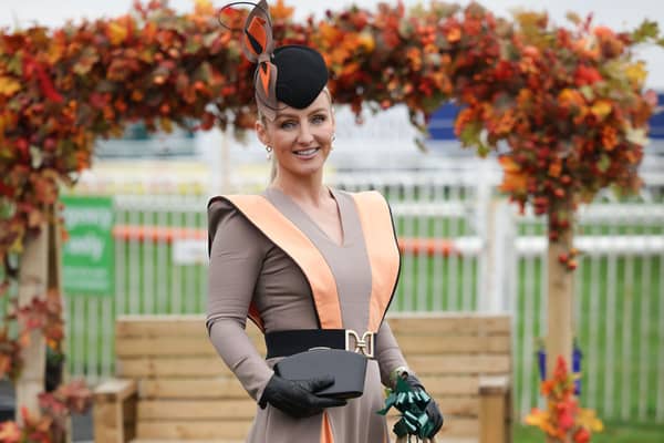 Lisa Walsh from Co. Meath claimed the Best Dressed prize at Down Royal on Saturday with a stunning ensemble, hired from Envious Style in Co. Meath, paired with her sophisticated headpiece and bag by Fiona Rafter.