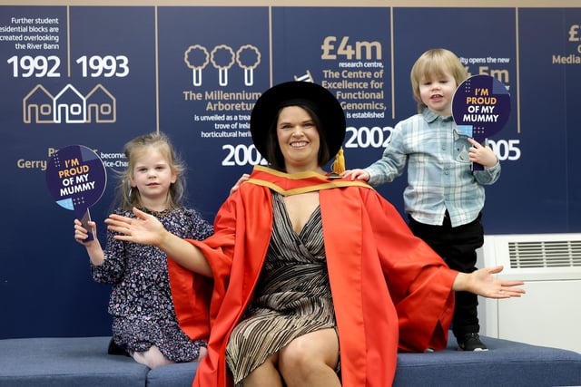 Lesley-Anne Henry from Cookstown graduates with a Phd  from the Ulster University Coleraine at the Graduation Winter Ceremony on Wednesday morning. Lesley-Anne is pictured with her children Clara (4) and Adam (2)