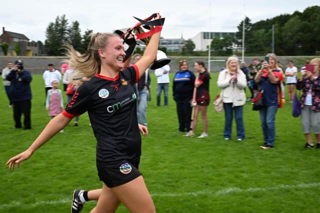 Down Camogs All-Ireland U23 C Champions celebrate with the trophy.