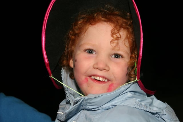 BONNET LASS...Little Sarah McAllister, enjoying the fireworks on Halloween night in Coleraine in 2010
