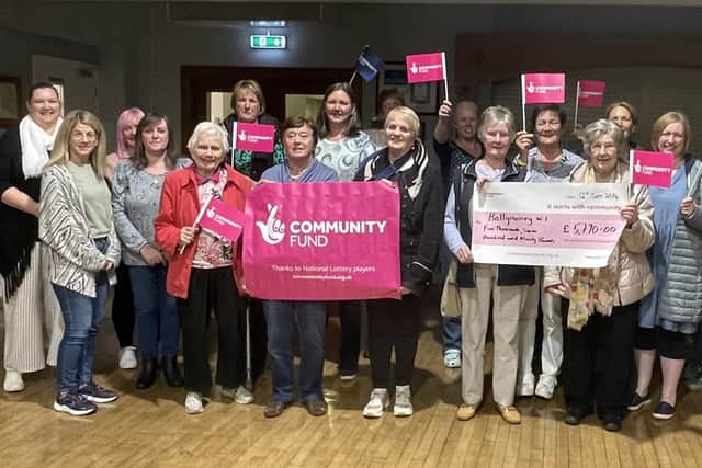 President Simone Christie with members of Ballymoney Women’s Institute celebrating news of their grant. The group was awarded a £5,790 grant from The National Lottery Community Fund to run activities for their members to reduce isolation and improve wellbeing.