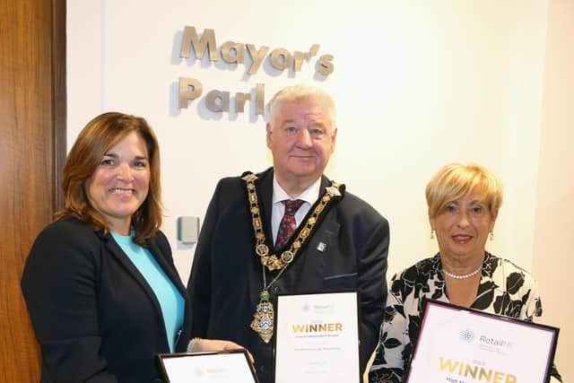 Pictured alongside the Mayor of Causeway Coast and Glens, Councillor Steven Callaghan and Julienne Elliott, Town & Village Manager is Winnie Mellett from Winsome Lady, winner of Silver for Best Fashion Retailer and Bronze for overall Independent Retailer of the Year.