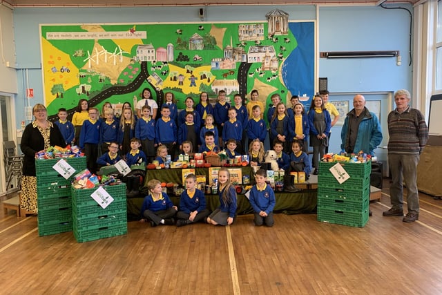 Hezlett Primary were delighted to present Causeway Food Bank with countless generous food donations kindly donated by their school families this harvest time