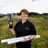 Lesley Allen, Operations Manager, Baileys Mallusk toasts the approval of planning permission for an extended Baileys Global Supply Facility at the site. Picture: Diageo