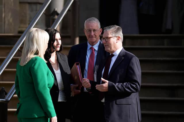 Northern Ireland Secretary Hilary Benn and Prime Minister Sir Keir Starmer at Stormont Caste recently. Legacy, Casement Park and Northern Ireland's finances have dominated the government's approach to Northern Ireland - but the TUV say there must be a greater focus on defence spending here. Photo: Niall Carson/PA Wire