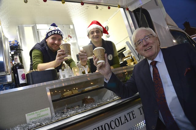 Stephen Coulter and Darren Adamson from The Quirky Clink with Alderman Allan Ewart MBE, Chair of the Lisburn & Castlereagh City Council Development Committee at the Christmas Market in Dundonald