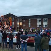 Residents gathered in the Clonmore Green area to pay their respects.